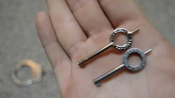 Handcuff Comparison, S&W M100 vs. Peerless M701C