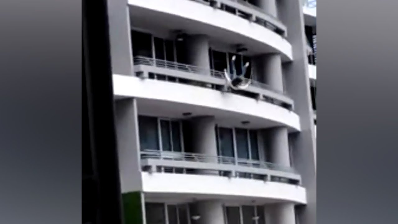 Woman falls to her death while sitting on 27th floor balcony railing