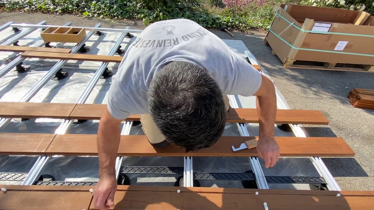 STEP 9   Exterpark bamboo decking easy decking installation with patented magnet system