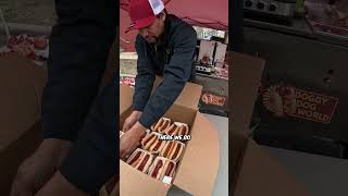 Handing Out Hot Dogs To Hungry People