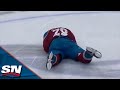 Nathan mackinnon bloodied after taylor hall catches him with head hit