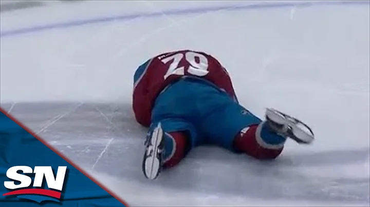 Nathan MacKinnon Bloodied After Taylor Hall Catche...