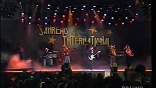 Video thumbnail of "Chris Rea - 𝘼𝙪𝙗𝙚𝙧𝙜𝙚
- Live @ Sanremo International  1991 🇮🇹"