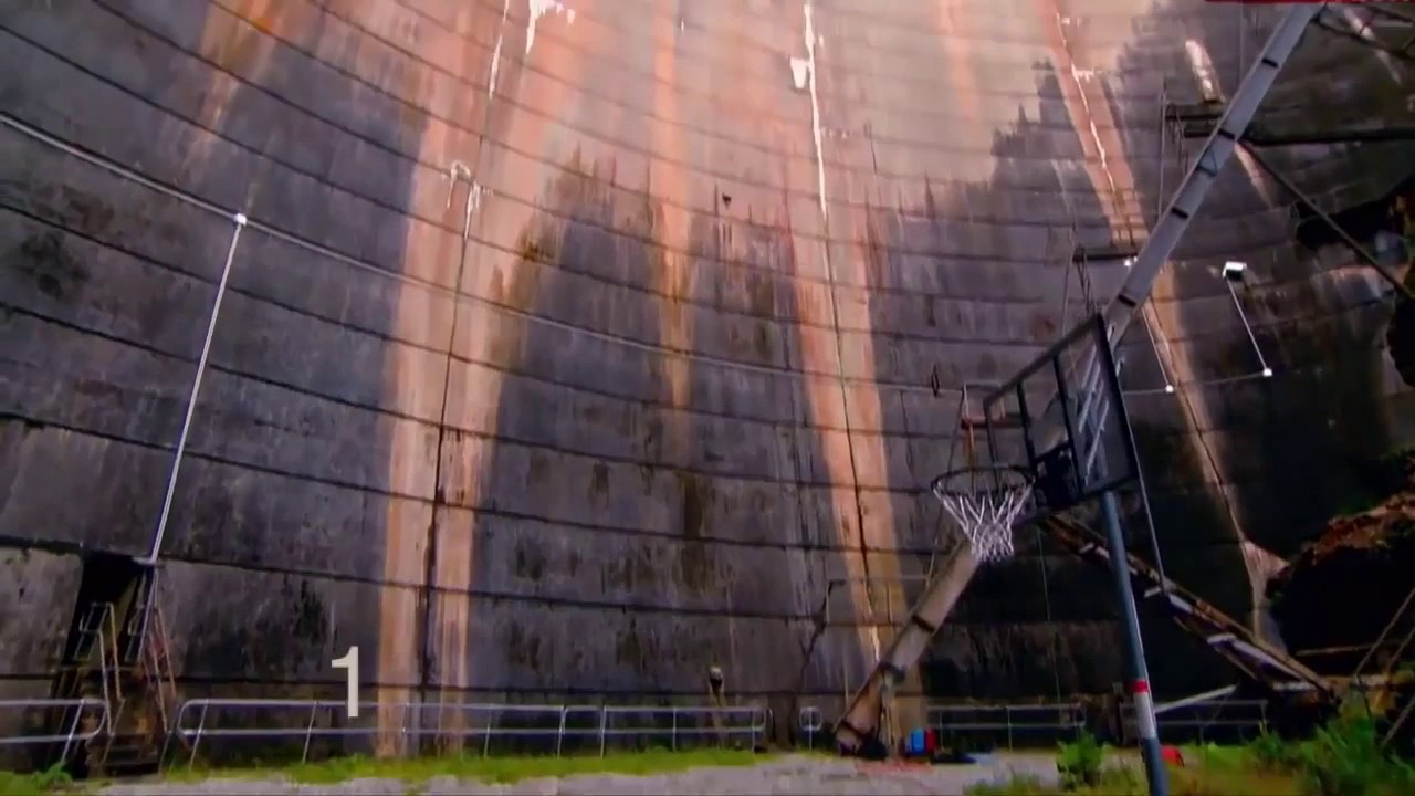 Watch what happens when a spinning basketball gets thrown off a dam