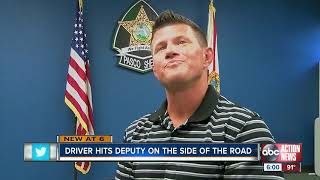 Pasco County deputy knocked out after van rear ends his patrol car