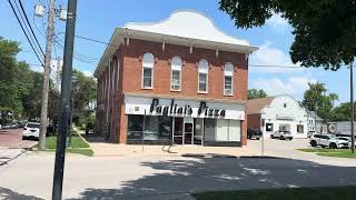 Holub Apartments, Pagliai's Pizza, and Laundromania under the same roof on North Linn Street in Iowa