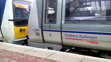 Chiltern 165023 (now in revised livery) and 168326 depart Aylesbury