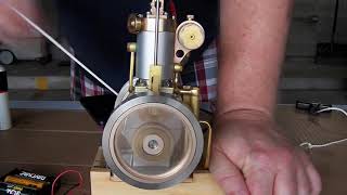 Vertical hit and miss engine running