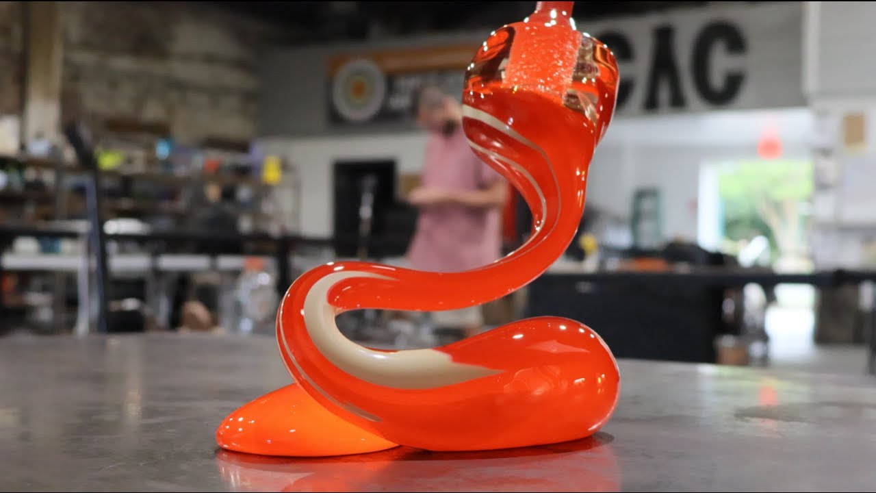sculpting molten glass into a one of a kind piece - narrated glassblowing demonstration