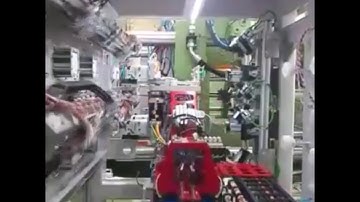 injection molding machine | 4 cavity wrap & buttom label iml robot and camera control