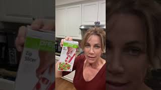 Zip Tomato slicer by Prep Solutions for cherry & grape tomatoes