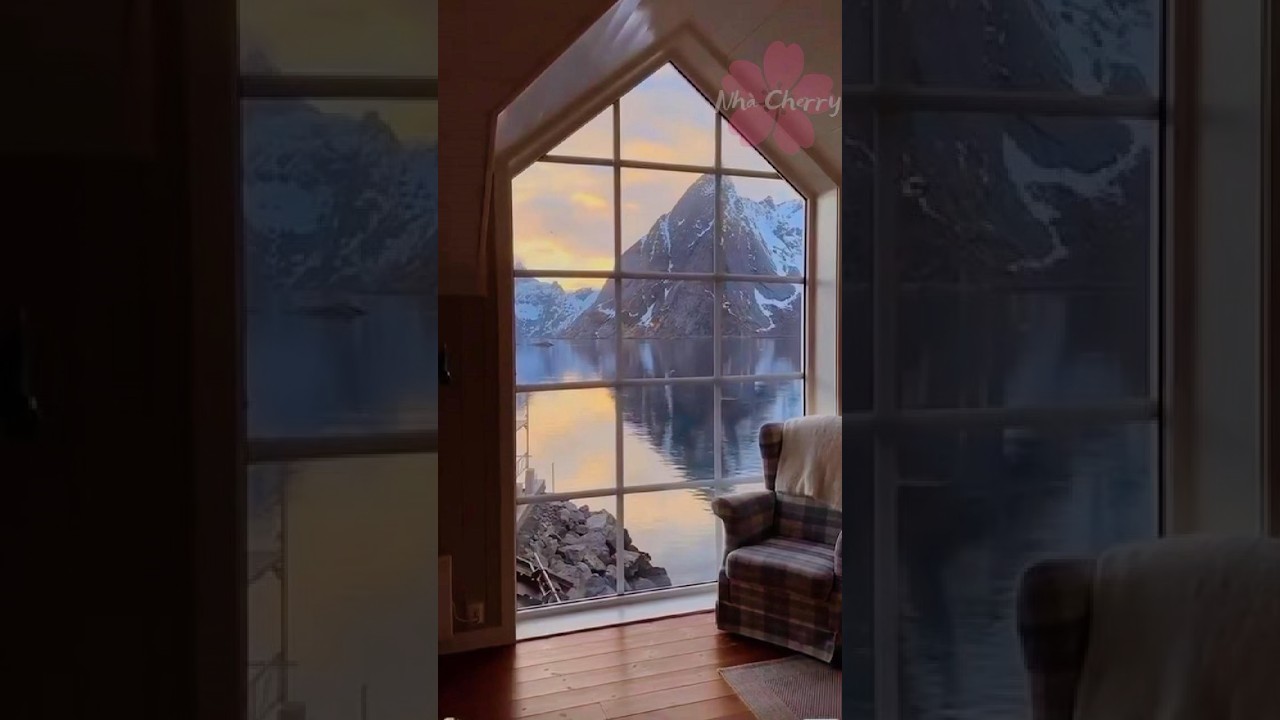 "Stunning Mountain View from a Cozy Cabin Window"