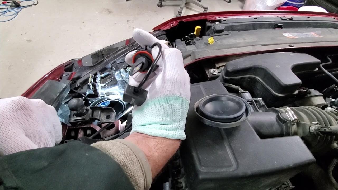 How to replace low beam and running light bulb on Ford Fusion bumper on YouTube