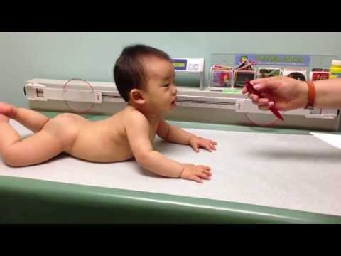 Baby Getting Weighed - Baby Getting Weighed