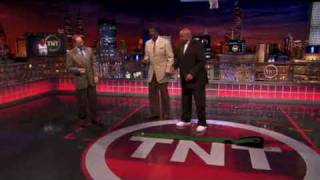 Chris Webber and Charles Barkley receive a specially made golf club