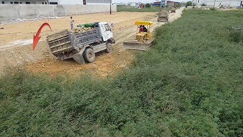 Best Action good skill operator build new road by bulldozer komatsu D20p pushing big stone