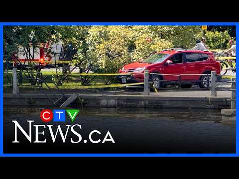 Vehicle dangles over Rideau Canal after crashing through barricade