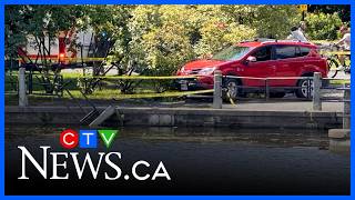 Vehicle dangles over Rideau Canal after crashing through barricade