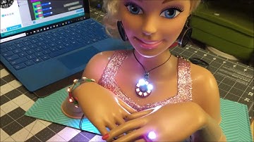 3 strips of Neopixels on Barbie coded with Maker MakeCode and CPX