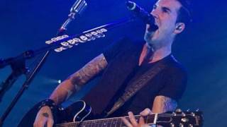 Theory Of A Deadman Interview
BareBonesMusic.com got a chance to catch up with DEAN BACK (bass, backing vocals) from the platinum selling band THEORY OF A DEADMAN. Dean spoke with Evil G. about the success the band has had with their last album Scars and Souvenirs and the pressure and expectations of their latest release The Truth Is... to match that success. He also talks about the dynamics of the bands songwriting styles, personal success milestones, playing to their hometown Canadian fans and their fans in the U.S. and Europe. Dean also discusses the bands plans for the rest of 2011 into 2012, his favorite song to play each night and how the band stays motivated during a long touring cycle and much more! All photos © Nathan Holt Photography, nholtphoto.com.
BareBonesMusic.com
http://www.barebonesmusic.com
Nathan Holt Photography
http://www.nholtphoto.com.com
Alternative Revolt
http://www.altrevolt.com Theory Of A Deadman Interview