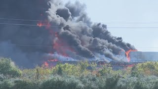 Fire crews still working to contain massive fire at former power plant in Galveston County