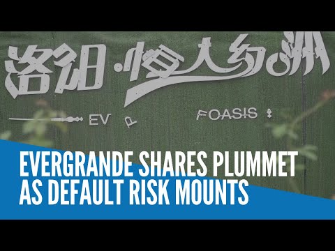 Evergrande shares plummet as default risk mounts