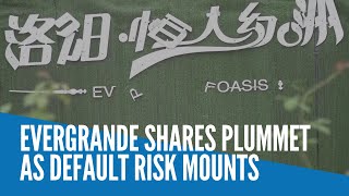 Evergrande shares plummet as default risk mounts
