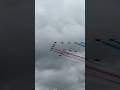 The RAF red arrows and The patrouille Suisse flying at RIAT 2024