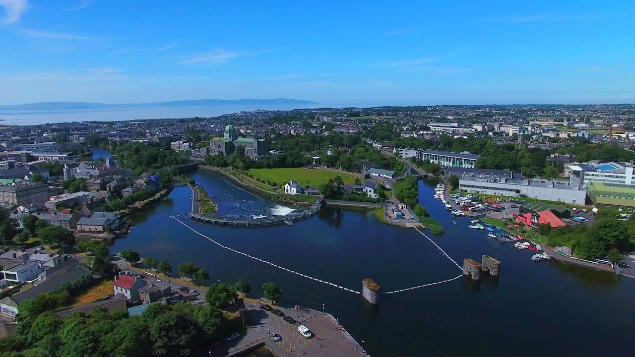 Galway Salmon Weir, Woodquay and Corrib River, Ireland by drone in 4K (The Frays - Never Say Never)