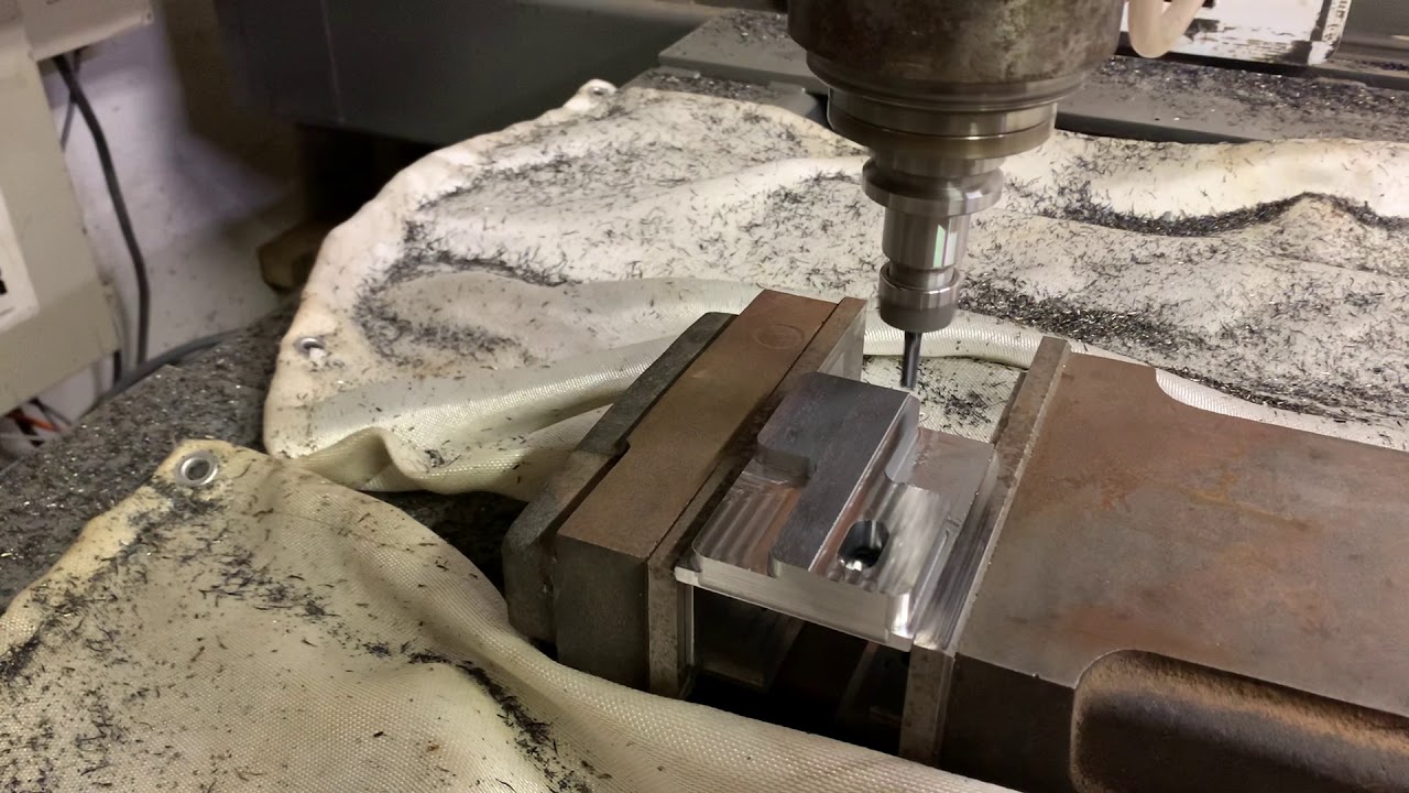 Steel bracket facing on CNC router - YouTube