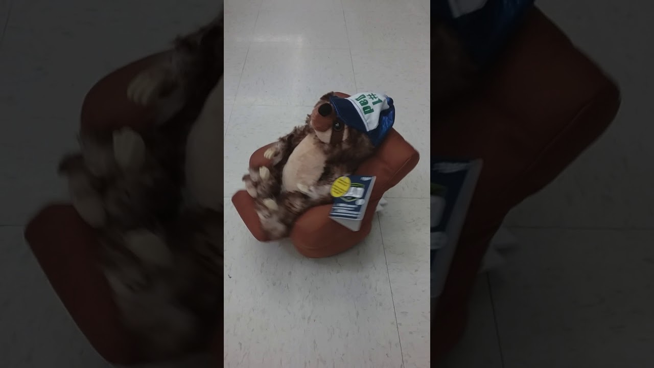 Gemmy animated singing spinning Father's Day sloth in chair