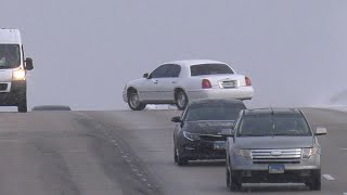 Vehicles sliding on Highway 367 from a dusting of snow in Florissant, MO - January 27, 2022