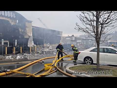 Two alarm fire rips through  dollar tree store in Frankford Philly