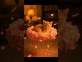 Kitten napping on cherry blossoms