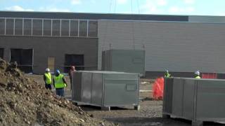 Helicopter hoists HVAC units onto Costco store in Ann Arbor, Michigan area
