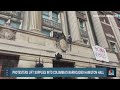 Protesters lift supplies into Columbia's barricaded Hamilton Hall