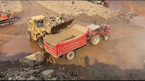 Massive Rocks Loading with Caterpillar Machine | Heavy Equipment in Action