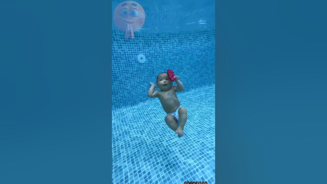 Cute Baby swimming in pool 🌞