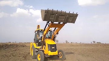 JCB Machine Blocking Water in Small River and Working For Bridge Coostruction - JCB Backhoe at Work