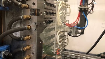 Efficiency in Action | Automated Injection Molding Cell for Two-Part Assembly