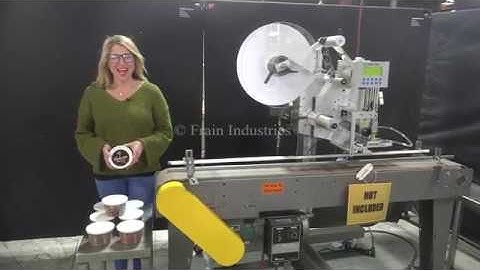 Label Aire  pressure sensitive, blow tamp spot labeler