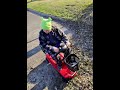 The birthday boy got a scooter for his birthday! He was very excited to try driving on his own.