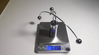 Balancing Toy Man Rocking Back and Forth Fluctuating Weight to 63.35 g in 2:00