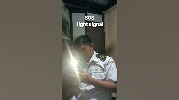 SOS. Morse light signal