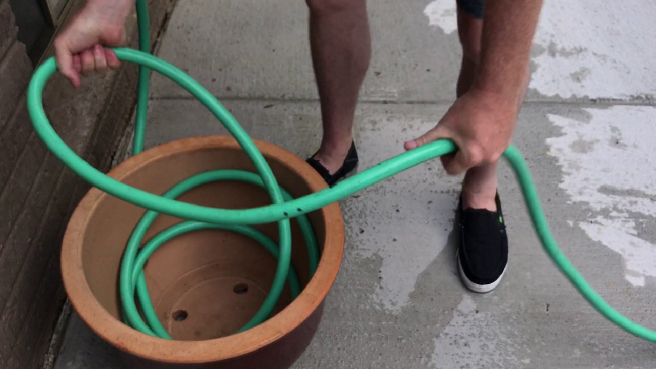 For Peggy Duncan How To Roll Up Hose In Flower Pot Hose Storage