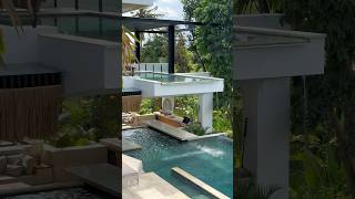 This Modern Tropical House Has A Small Waterfall Inside 