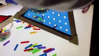 geo shapes and lacing tubes  on the light table