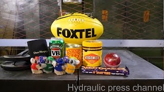 Crushing huge pile of Australian stuff with hydraulic press