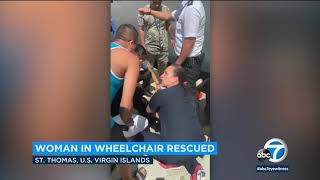 2 men rescue cruise ship passenger in wheelchair who fell from dock | ABC7