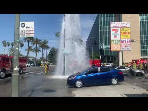 TNLA- LAFD Firefighters shut down hydrant after high speed crash